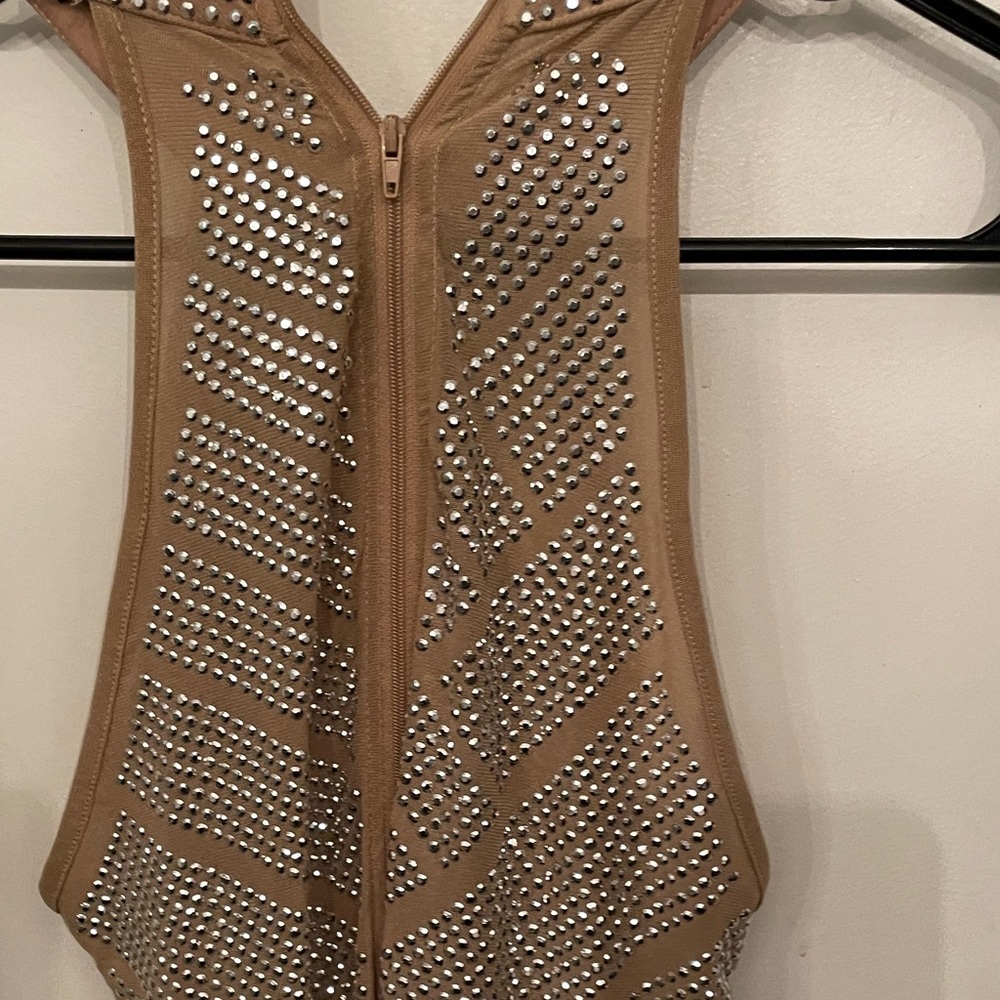 Nude/ Tan color size large very stretchy great for birthday or special occasion
